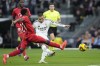 Real Madrid's Kylian Mbappe scores the opening goal during the Spanish La Liga soccer match between Real Madrid and Sevilla at the Santiago Bernabeu Stadium in Madrid, Spain, Sunday, Dec. 22, 2024. (AP Photo/Bernat Armangue)