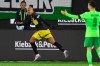 Dortmund's Donyell Malen, left, celebrates after scoring their side's first goal of the game during the Bundesliga soccer match between VfL Wolfsburg and Borussia Dortmund, in Wolfsburg, Germany, Sunday Dec. 22, 2024. (Swen Pförtner/dpa via AP)