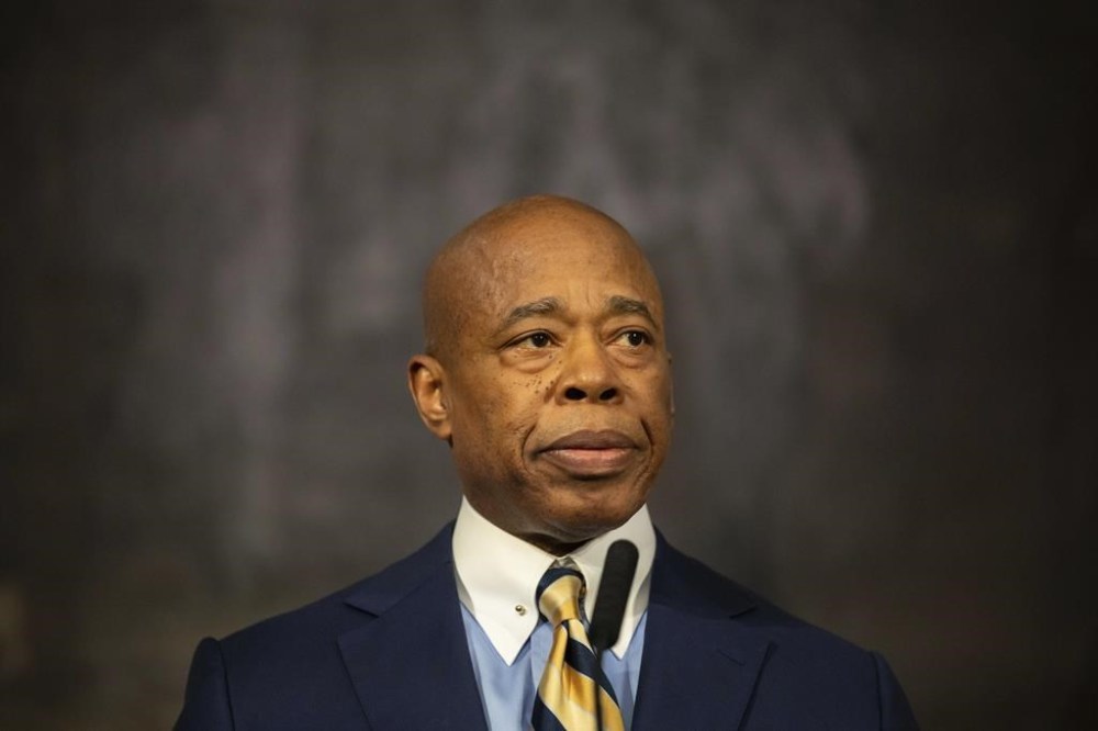 FILE - New York City Mayor Eric Adams speaks during a press conference at City Hall following a meeting with President-elect Donald Trump's incoming