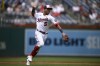 FILE - Washington Nationals third baseman Ehire Adrianza prepares to throw during a baseball game against the Atlanta Braves, July 17, 2022, in Washington. (AP Photo/Nick Wass, File)