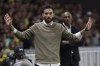 FILE - Olympiacos' head coach Carlos Corberan reacts during the Europe League soccer match between Nantes and Olympiacos at the Stade de la Beaujoire in Nantes, western France, Sept. 8, 2022. (AP Photo/Jeremias Gonzalez, File)