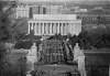 FILE - The funeral procession for the late President John Fitzgerald Kennedy, the nation's youngest president struck down by an assassin's bullets, crossed the bridge leading to Arlington National Cemetery in Arlington, Va., Nov. 25, 1963. The procession slowly moves over the Memorial Bridge, with Lincoln memorial in background, monument to another slain president. (AP Photo, File)