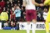 Referee Chris Kavanagh awards a penalty to West Ham United following a VAR check, during the English Premier League soccer match between Bournemouth and West Ham United, at the Vitality Stadium, in Bournemouth, England, Monday, Dec. 16, 2024. (Zac Goodwin/PA via AP)