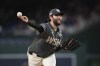 FILE - Washington Nationals pitcher Trevor Williams throws during the first inning of a baseball game against the Philadelphia Phillies, Friday, Sep. 27, 2024, in Washington. (AP Photo/Terrance Williams, File)