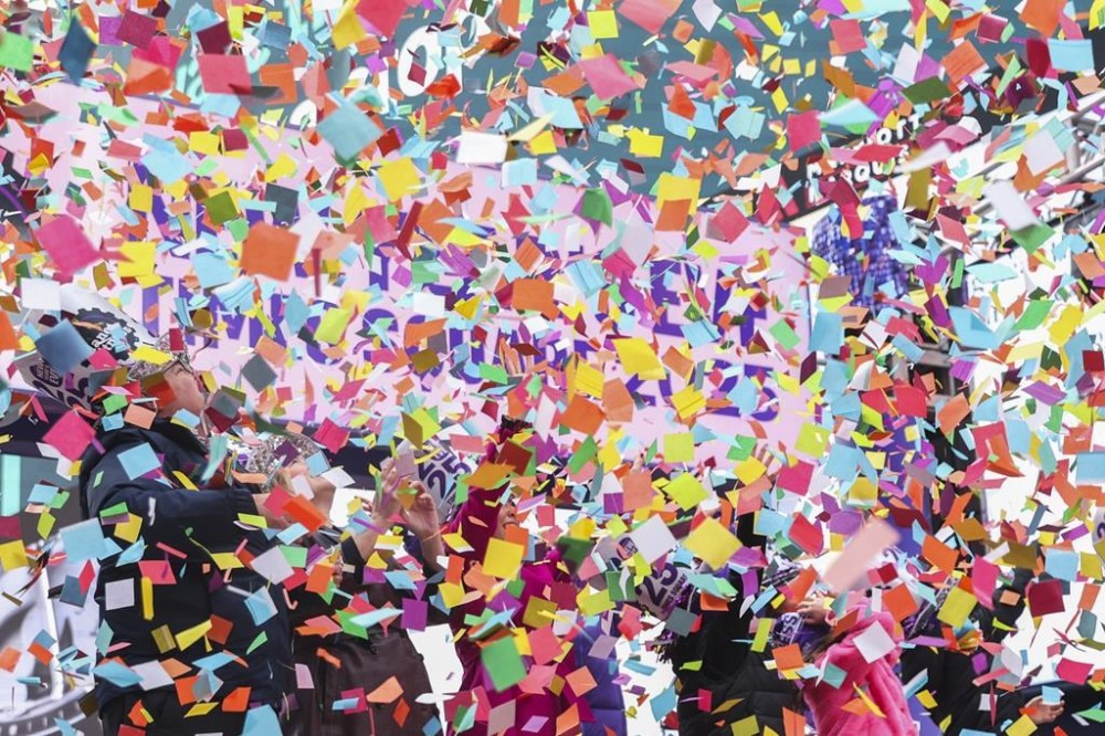 Organizers throw confetti ahead of New Year's Eve in Times Square, Sunday, Dec. 29, 2024, in New York. (AP Photo/Heather Khalifa)