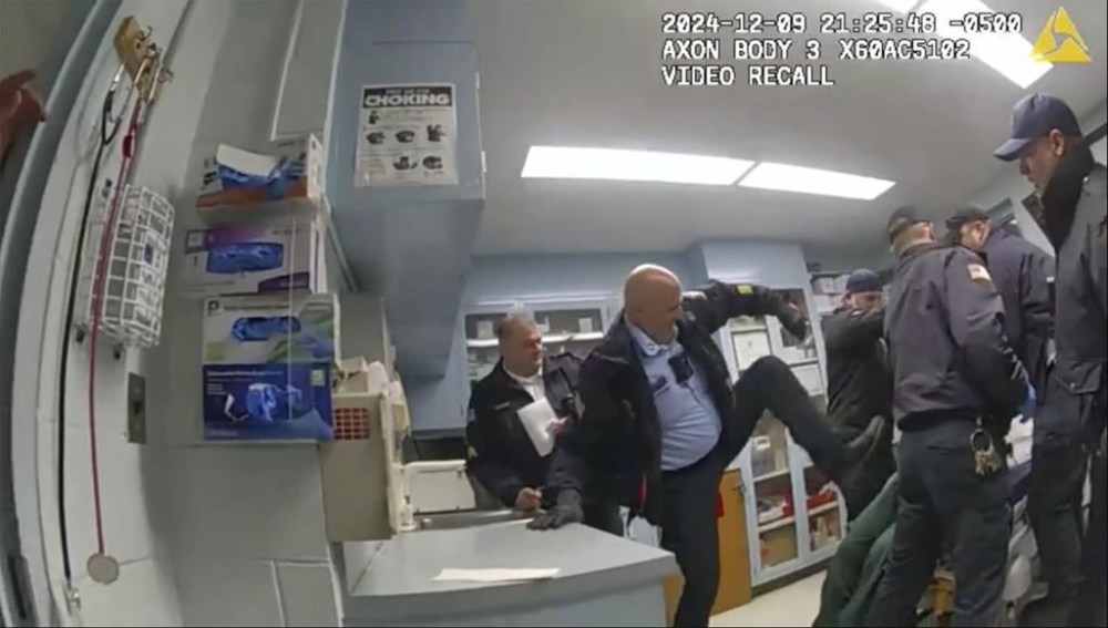 FILE - This image provided by the New York State Attorney General office shows bodycam footage of correction officers beating a handcuffed man, Robert Brooks, 43, at the Marcy Correctional Facility in Oneida County, N.Y., on Dec. 9, 2024. (New York State Attorney General office via AP, File)