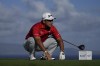 Hideki Matsuyama, of Japan, watches his shot from the 13th tee during the pro-am round of The Sentry golf event, Wednesday, Jan. 1, 2025, at Kapalua Plantation Course in Kapalua, Hawaii. (AP Photo/Matt York)