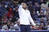 New Orleans Pelicans head coach Willie Green, center, points to his players in the second half of an NBA basketball game against the Memphis Grizzlies in New Orleans, Friday, Dec. 27, 2024. (AP Photo/Peter Forest)