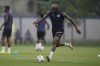 FILE - Ivory Coast's Seko Fofana runs with the ball during their training in Abidjan, Ivory Coast, Feb. 6, 2024. (AP Photo/Sunday Alamba)