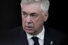Real Madrid's head coach Carlo Ancelotti watches during the Spanish La Liga soccer match between Real Madrid and Sevilla at the Santiago Bernabeu Stadium in Madrid, Spain, Sunday, Dec. 22, 2024. (AP Photo/Bernat Armangue)
