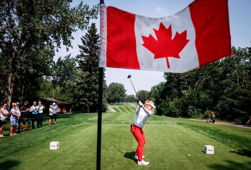 Canada's Brooke Henderson hits a tee shot on the fourth hole during the second round at the LPGA Canadian Women's Open golf tournament in Calgary on July 26, 2024. THE CANADIAN PRESS/Jeff McIntosh