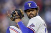 FILE - Texas Rangers relief pitcher Grant Anderson winds up during the eighth inning of a baseball game against the Detroit Tigers, June 4, 2024, in Arlington, Texas. (AP Photo/Gareth Patterson, File)
