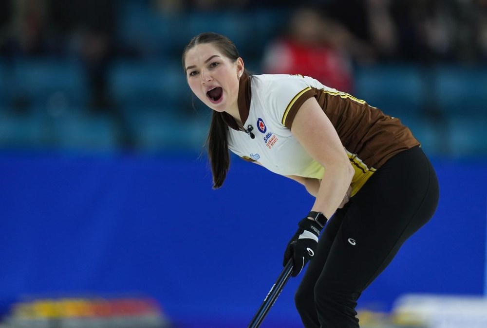 Team Kerri Einarson is adding three-time world junior champion Karlee Burgess to its lineup. Burgess calls out to the sweepers after delivering a rock in the ninth end of Manitoba's playoff win over Northern Ontario at the Scotties Tournament of Hearts in Kamloops, B.C., on Saturday, Feb. 25, 2023. THE CANADIAN PRESS/Darryl Dyck