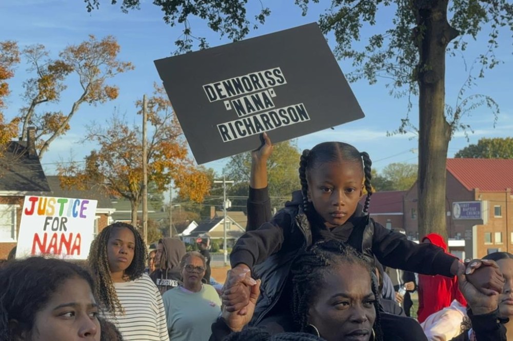 Marchers gather in front of the Colbert County courthouse to demand an investigation into the death of Dennoriss Richardson and improve transparency from local law enforcement in Tuscumbia, Ala., on Nov. 23, 2024. (Safiyah Riddle/ (AP Photo/Safiyah Riddle)