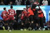 AC Milan players celebrate after scoring during the Italian Super Cup semifinal soccer match between Juventus and Milan in Riyadh, Saudi Arabia, Friday, Jan. 3, 2025. (AP Photo/Altaf Qadri)