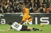 Real Madrid's Vinicius Junior, top, and Valencia's Cesar Tarrega fight for the ball during a Spanish La Liga soccer match at Mestalla stadium in Valencia, Spain, Friday, Jan. 3, 2025. (AP Photo/Alberto Saiz)