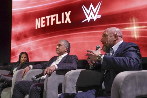 From left, Netflix Chief Content Officer Bela Bajaria, WWE President Nick Khan and WWE Chief Content Officer Paul 