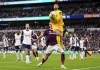 Tottenham Hotspur goalkeeper Brandon Austin catches the ball from a corner during the English Premier League soccer match between Tottenham Hotspur and Newcastle United at the Tottenham Hotspur Stadium, London, Saturday Jan. 4, 2025. (John Walton/PA via AP)