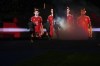 Roma players run out of the field before a Serie A soccer match between Roma and Lazio, at the Stadio Olimpico in Rome, Italy, Sunday, Jan. 5, 2025. (AP Photo/Alessandra Tarantino)