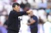 FILE -Indonesian national team Head coach Shin Tae Yong talks to his players during the Asian Cup round of 16 soccer match between Australia and Indonesia at Jassim Bin Hamad Stadium in Doha, Qatar, Jan. 28, 2024. (AP Photo/Hussein Sayed, File)