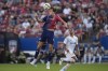 FC Dallas forward Petar Musa (9) jumps for a header in front of Los Angeles Galaxy defender Jalen Neal, right, during the first half of an MLS soccer match Saturday, July 13, 2024, in Frisco, Texas. CF Montréal has acquired Neal from the Los Angeles Galaxy, the Major League Soccer club announced Monday. THE CANADIAN PRESS/AP/LM Otero