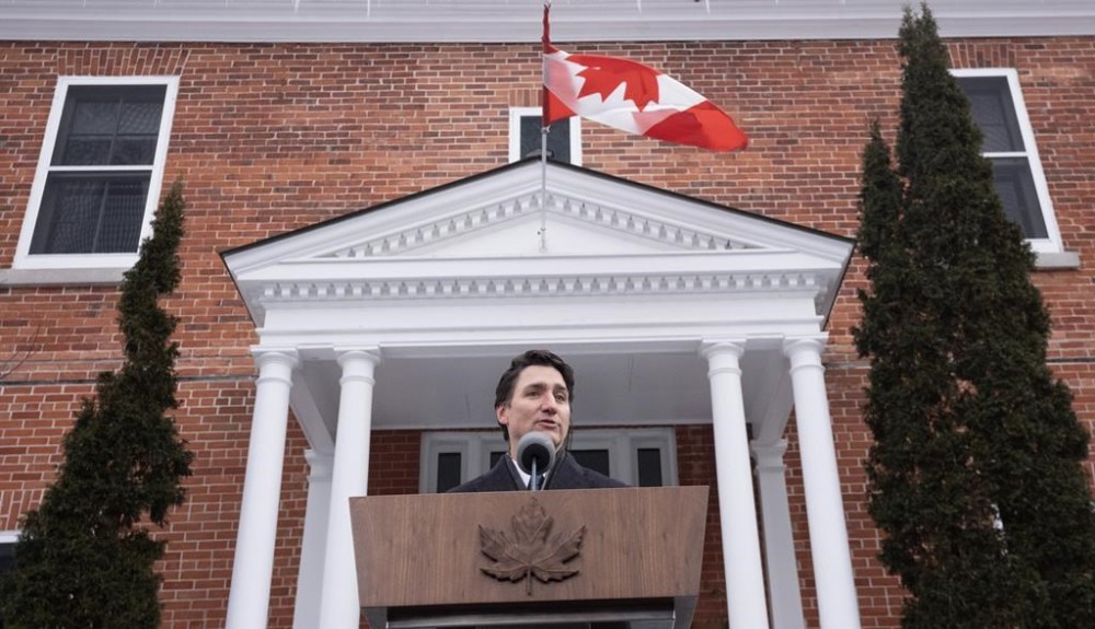 Prime Minister Justin Trudeau speaks with media outside Rideau Cottage, Monday, Jan. 6, 2025 in Ottawa. THE CANADIAN PRESS/Adrian Wyld