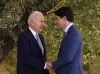 Canadian Prime Minister Justin Trudeau talks with U.S. President Joe Biden as they take part in a family photo at the G7 Summit in Savelletri Di Fasano, Italy on Thursday, June 13, 2024. Biden says he is proud to call Trudeau a friend as the Canadian and American prepare for their departures from leadership.THE CANADIAN PRESS/Sean Kilpatrick