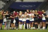 FILE - United States coach Emma Hayes of Britain talks to her players after a women's Group B soccer match between Australia and the United States, at the Marseille Stadium, at the 2024 Summer Olympics, in Marseille, France, July 31, 2024. (AP Photo/Daniel Cole, File)