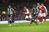 Newcastle's Alexander Isak, third right, on his way to scoring the opening goal during the English League Cup semifinal first leg soccer match between Arsenal and Newcastle United at the Emirates stadium in London, Tuesday, Jan. 7, 2025. (AP Photo/Kirsty Wigglesworth)