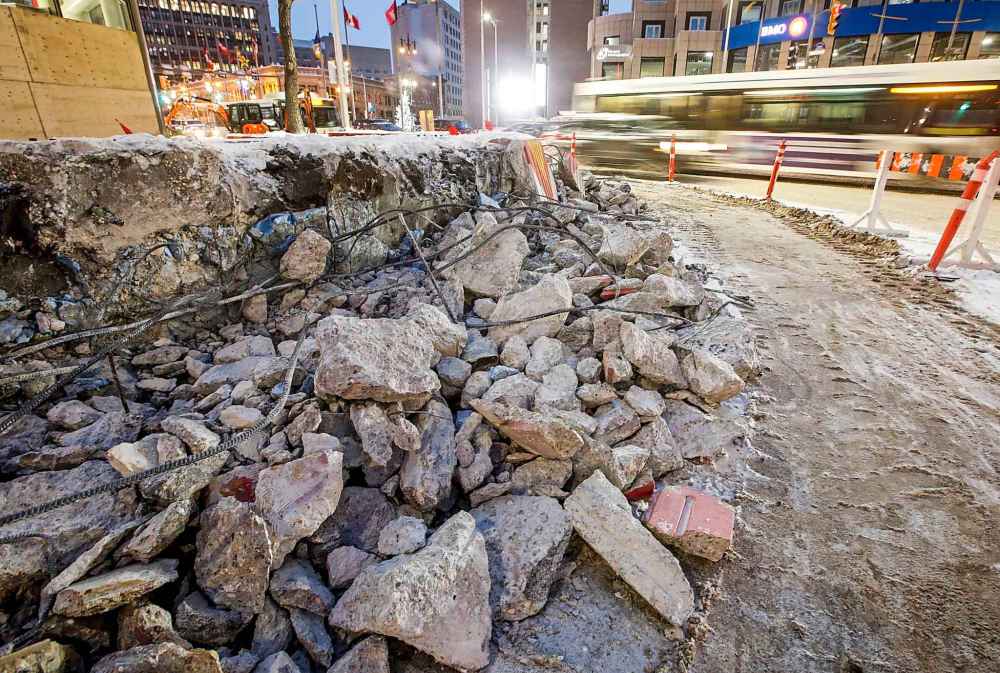 Repairing the membrane that waterproofs the underground concourse was estimated to come with a $73-million price tag, sparking the decision to open the corner to foot traffic. (John Woods / Free Press)