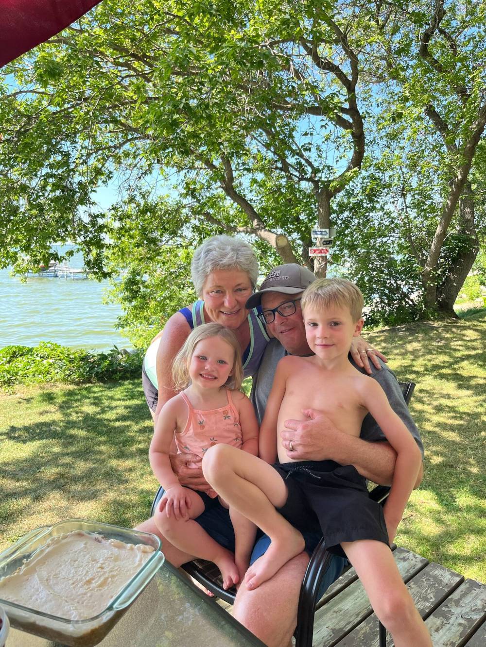 SUPPLIED
Jago and his wife Janet with their grandchildren, Scottie and Walker.