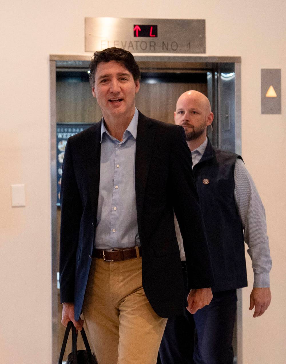 AP Photo/Carolyn Kaster
Canada Prime Minister Justin Trudeau briefly speaks to media as he walks through the lobby of the Delta Hotel by Marriott Nov. 30 in West Palm Beach, Fla.