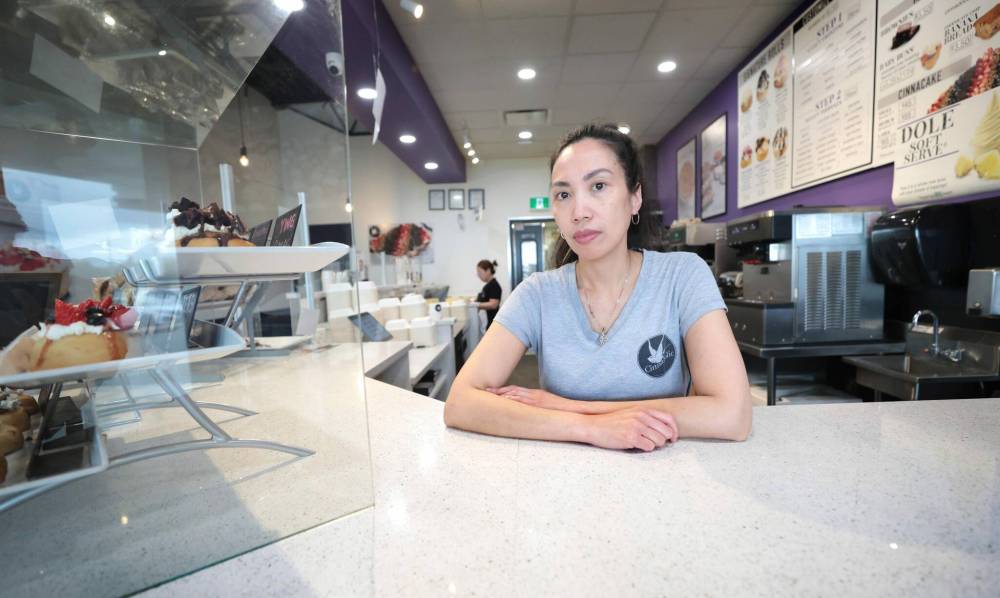 Ruth Bonneville / Free Press Files
Menchie Finlay is the co-owner of two Cinnaholic bakery outlets in Winnipeg. Finlay said they eliminated cash payments at the shop on McPhillips Street last May because of repeated incidents of crime.