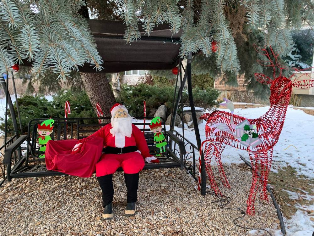 LARRY BREDESEN PHOTO
Life-sized Santa enjoyed chilling in his Southdale neighbourhood before he was kidnapped.