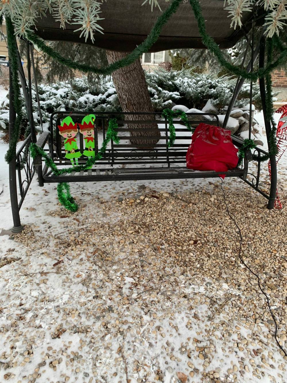 LARRY BREDESEN PHOTO
The jolly old elf went missing from his swing this past weekend, police don’t believe he went back to the North Pole, either.