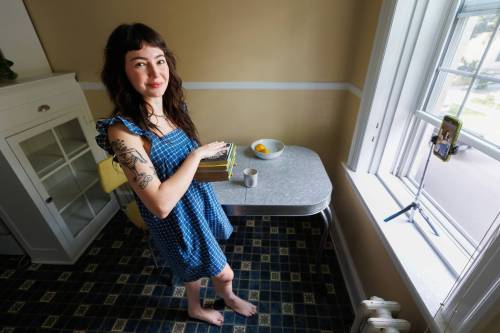 MIKE DEAL / FREE PRESS
                                Lauren Hower, now a full-time content creator on TikTok, regularly posts two or three BookTok videos each week.