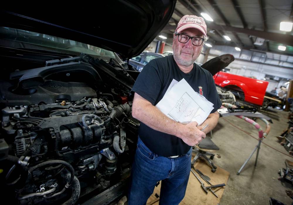 JOHN WOODS / FREE PRESS FILES
                                Johnny Vernaus, owner of Vernaus Auto Body told the Free Press Wednesday he and fellow business owners are “not beyond a class-action lawsuit” to oppose the plans.