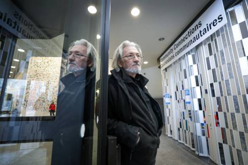 RUTH BONNEVILLE / WINNIPEG FREE PRESS LOCAL - Millennium Library Photo of Al Wiebe near front doors of the Millennium Library. See story on how he helped advocate for the community connections space at Millennium Library and helped train city staff for the facility. He&rsquo;s sad it&rsquo;s closed but understands concerns for safety. March 9th,, 2023