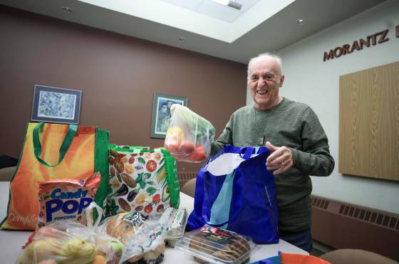 Volunteering with the Hanukkah food program is a way for Barry Weber to contribute to his community. (Ruth Bonneville / Free Press files)