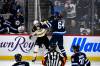Fred Greenslade / THE CANADIAN PRESS
                                Jets D-man Logan Stanley (right) exchanges blows with Boston’s Mark Kastelic Tuesday night.