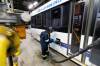 MIKE DEAL / FREE PRESS FILES
                                Rhenan fills up a bus with diesel fuel while he does the vehicles daily service maintenance. The Winnipeg Transit Service and Maintenance buildings at 421 Osborne Street. See AV Kitching story 231205 - Tuesday, December 05, 2023.