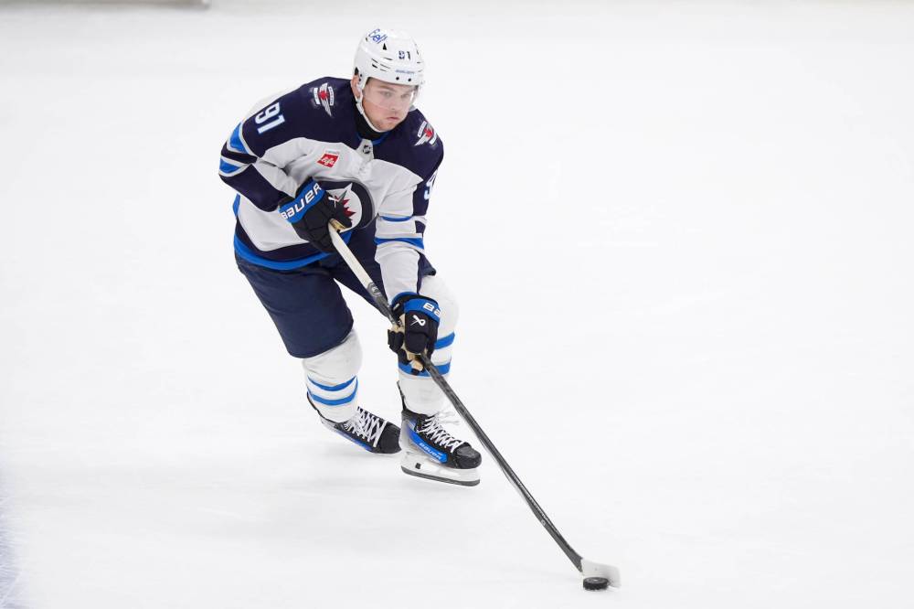 LM Otero / The Associated Press
Jets forward Cole Perfetti is happy to have his mother join the team on its two-game sojourn to California.