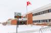 MIKE DEAL / FREE PRESS
                                Elmwood High School was closed again Tuesday morning after another threat but reopened in the afternoon.