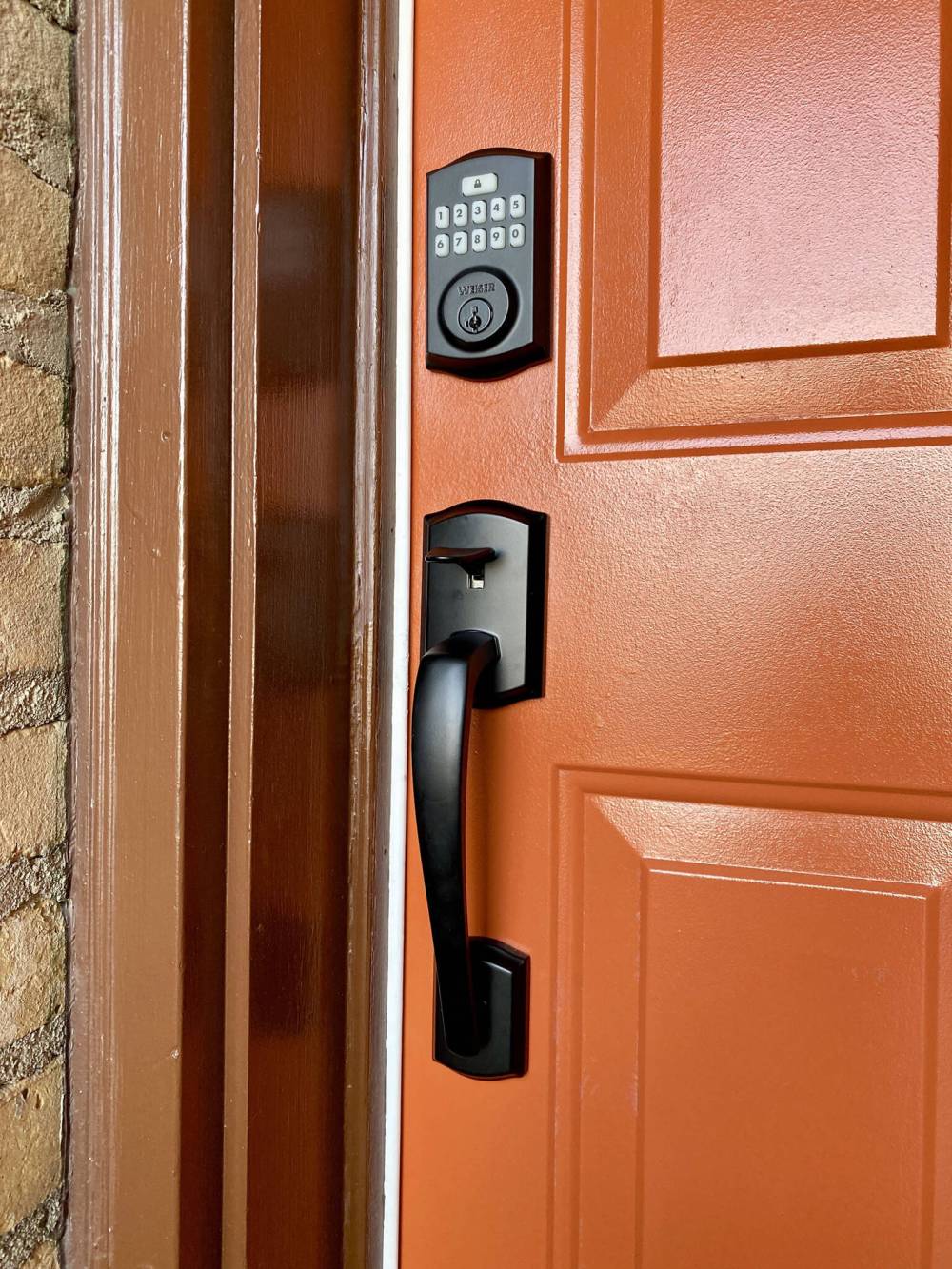 The main entry door to the foyer received a pull-handle upgrade along with the introduction of a keypad.