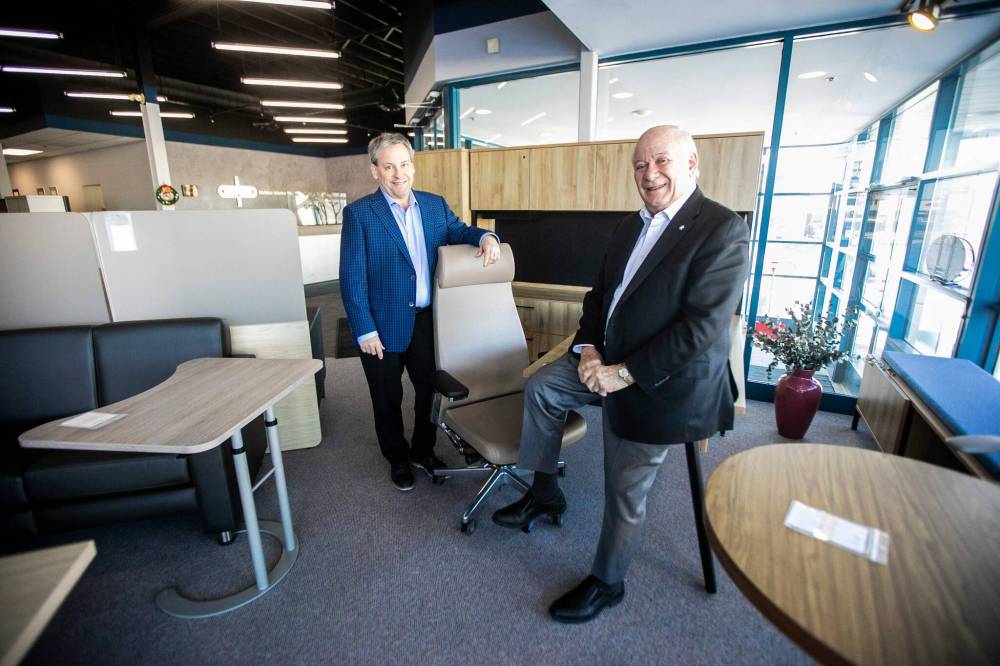 MIKAELA MACKENZIE / FREE PRESS
Rob Cunningham, president, and Bob Cunningham, founder and CEO, at the Cunningham Business Interiors showroom in Winnipeg.
