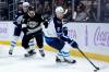 Ryan Sun / The Associated Press files
                                Jets defenceman Colin Miller (right) hasn’t missed a beat since returning to the lineup.