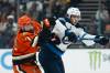 Kyusung Gong / The Associated Press
                                Anaheim Ducks defenceman Radko Gudas checks Winnipeg Jets forward Morgan Barron in the second period, Wednesday, in Anaheim.