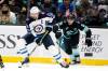 Elaine Thompson / The Associated Press files
                                Blake Wheeler (left) worked hard on and off the ice to be the best leader he could be.