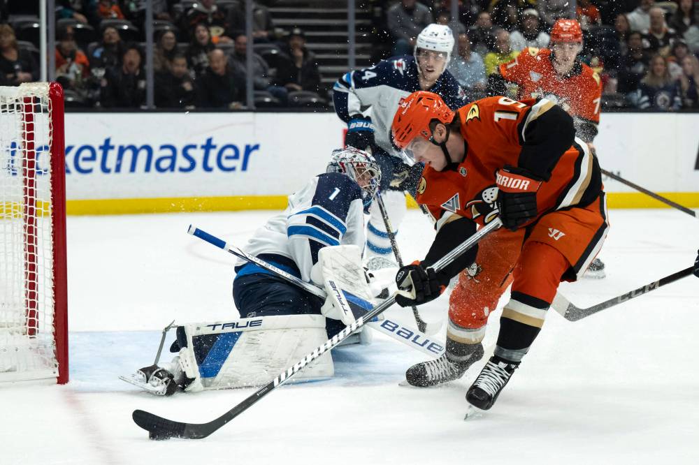 Kyusung Gong / The Associated Press
Anaheim forward Troy Terry attacks the Jets net Wednesday in Anaheim.