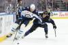 NATHAN DENETTE / THE CANADIAN PRESS FILES
                                Jets captain Adam Lowry and his teammates look to pick up where they left off before the Christmas break which they entered on a two-game winning streak.